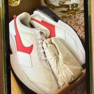 Nike Women’s White and Red Sneakers
